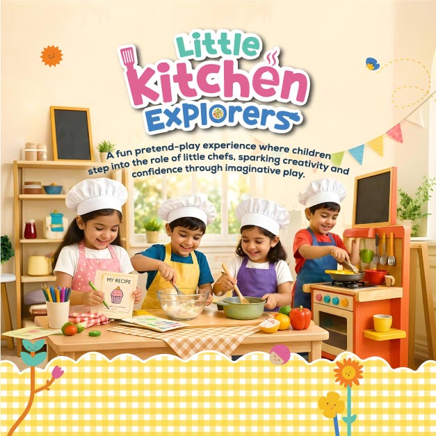 Children wearing chef hats and aprons participating in the 'Little Kitchen Explorers' pretend-play activity at Mindseed preschool and daycare.